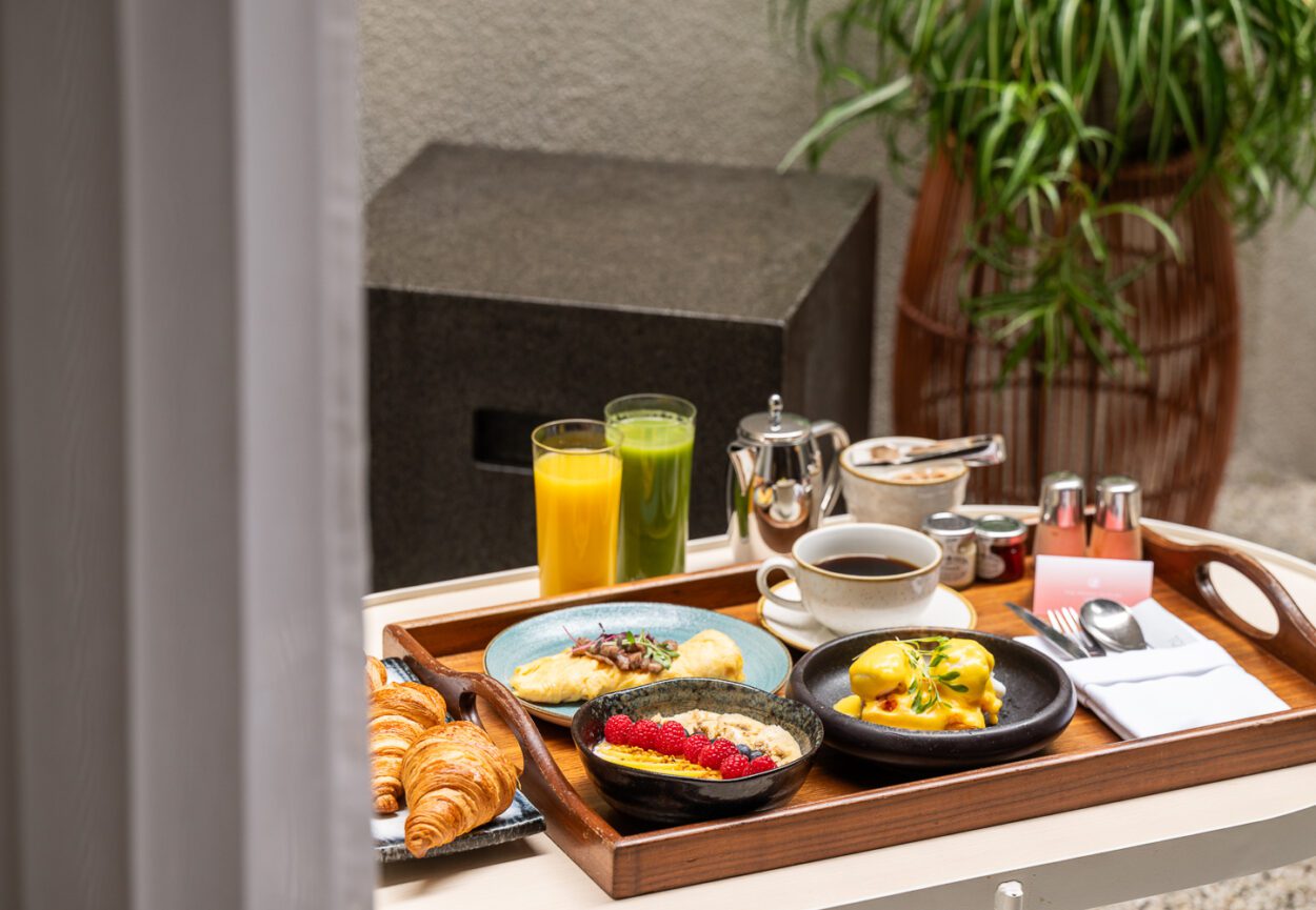 A tray of breakfast foods, drinks and tea in The Prince Akatoki Hotel in London