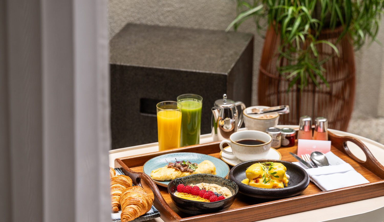 A tray of breakfast foods, drinks and tea in The Prince Akatoki Hotel in London