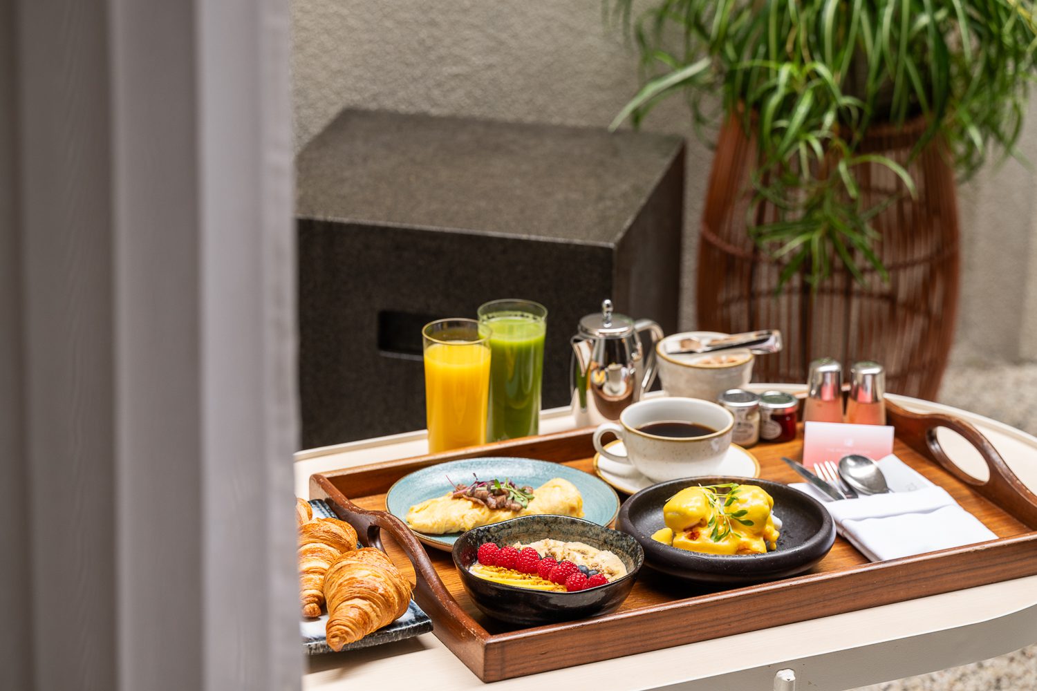 A tray of breakfast foods, drinks and tea in The Prince Akatoki Hotel in London